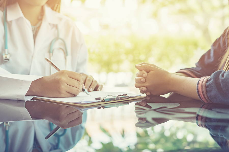 Doctor working with a patient